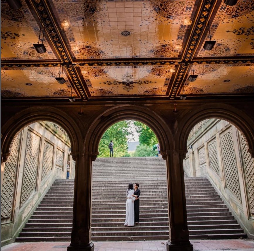 Embrace on the Bethesda Terrace stairs - Central Park Wedding - New York City