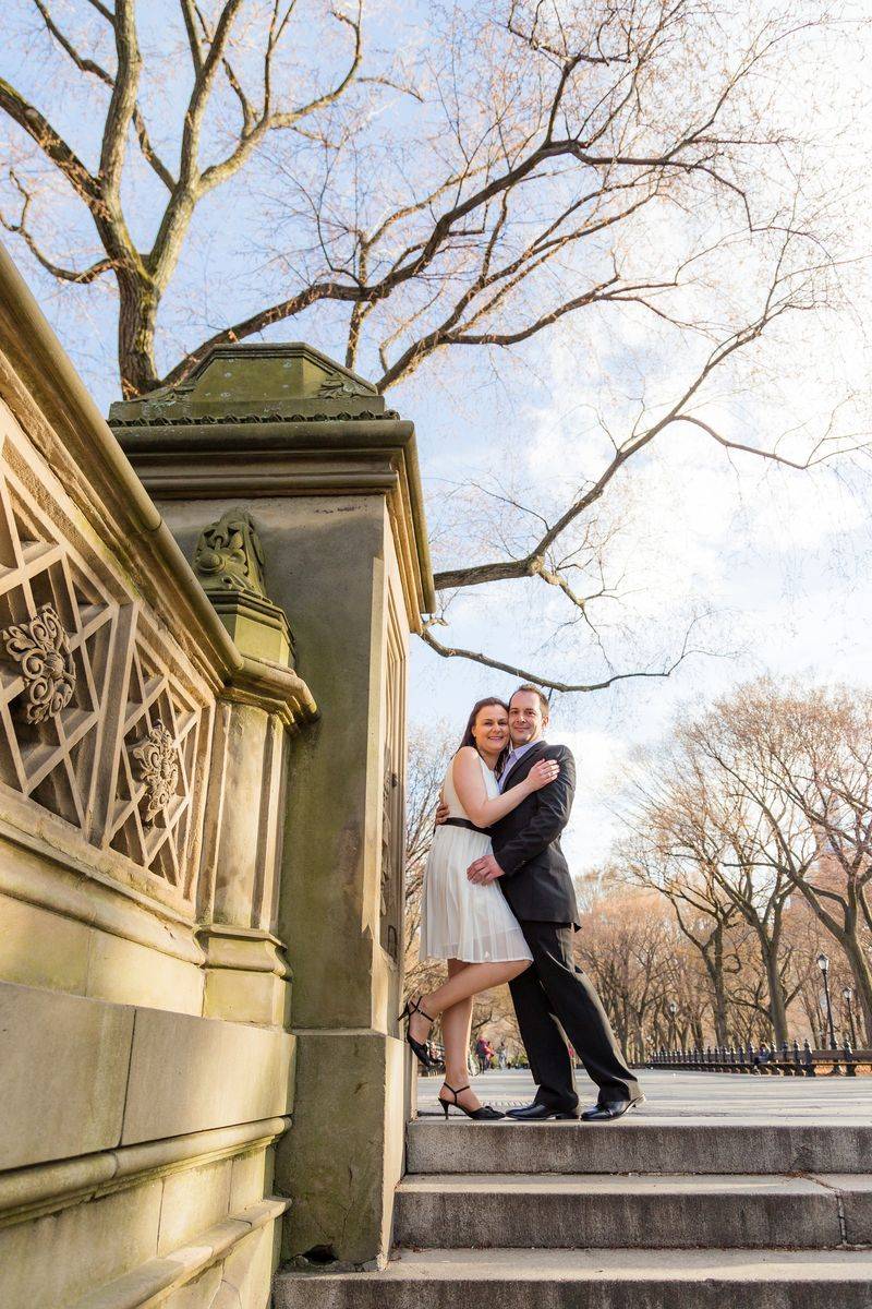 Newlyweds on the terrace steps at Bethesda Terrace - Central Park Wedding - New York City