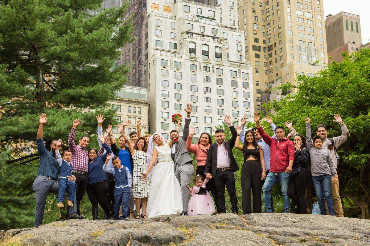 The whole family celebrating at Cop Cot - Central Park Wedding - New York City
