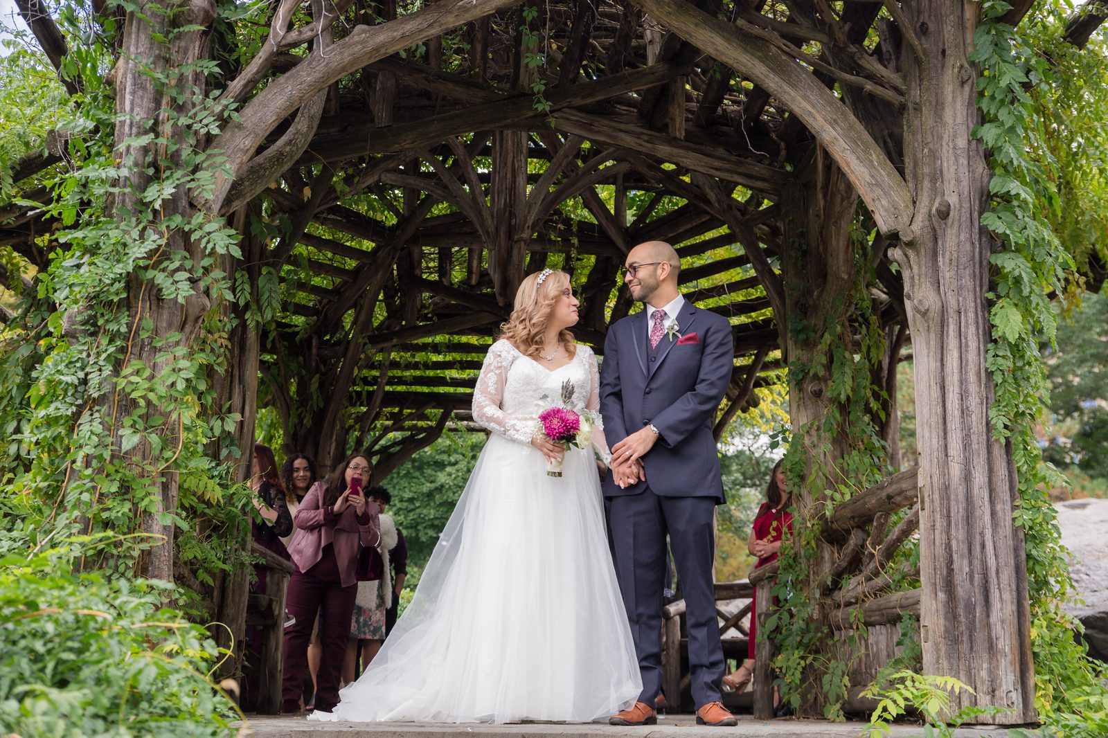 Couple framed by the entire wooden Dene Summerhouse - Central Park Wedding - New York City