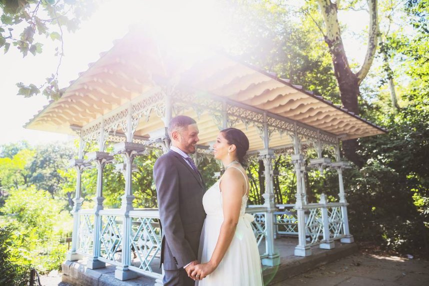 Sun flare over the newlyweds at Ladies Pavilion - Central Park Wedding - New York City