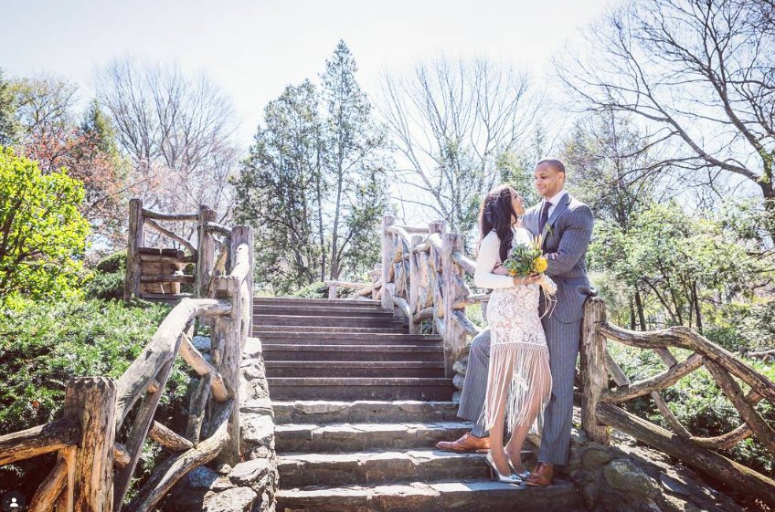 Embrace on the garden steps at Shakespeare Garden - Central Park Wedding - New York City